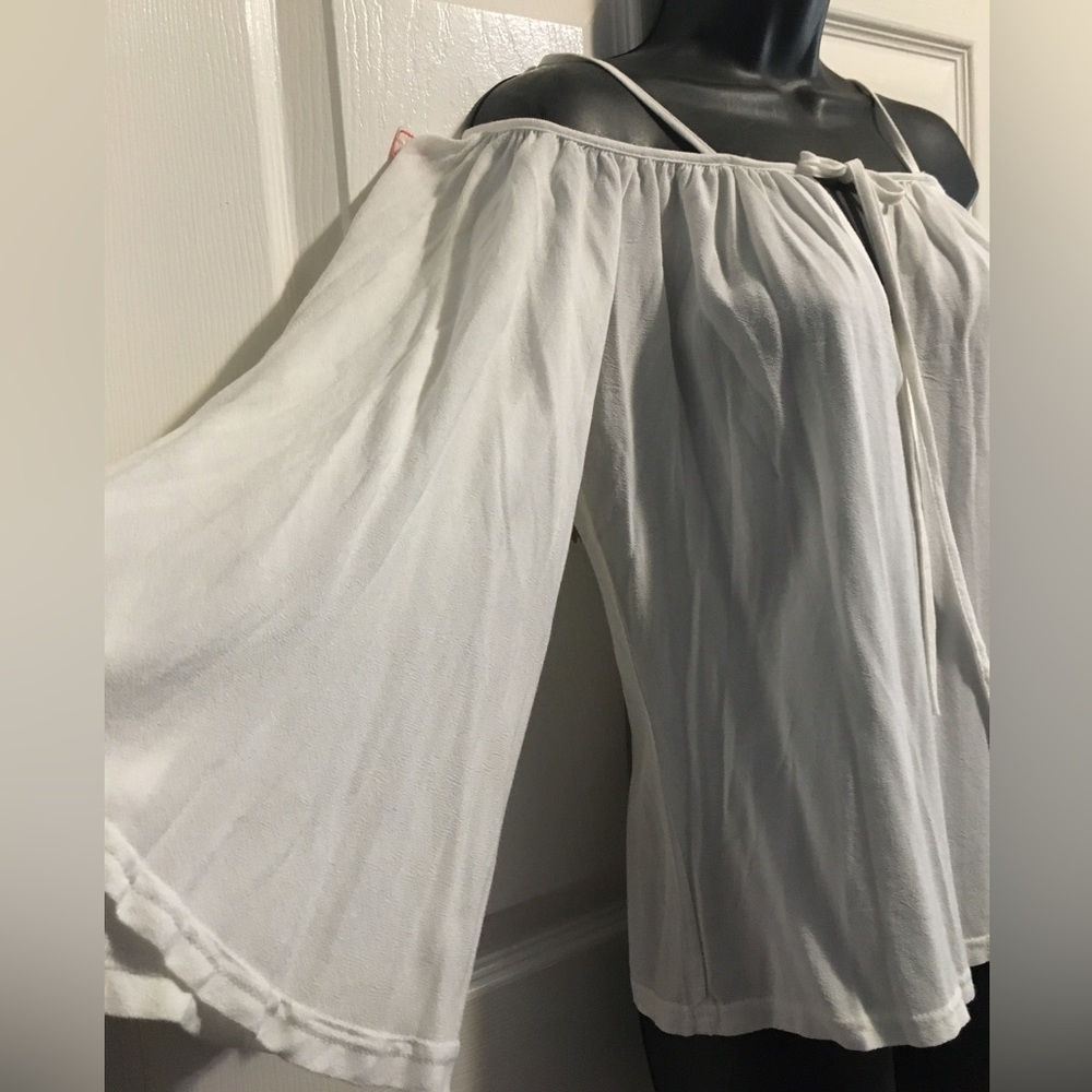 White Cold Shoulder Top with flare wing sleeves.